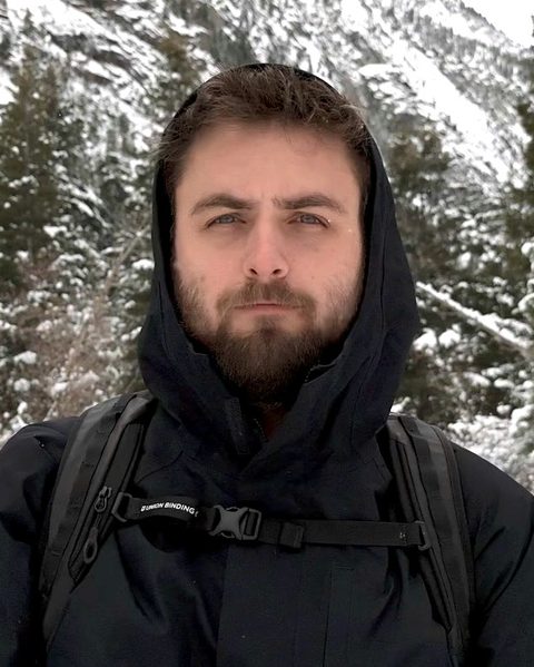 Grady, founder of Foothold Sites, outdoors in the mountains
